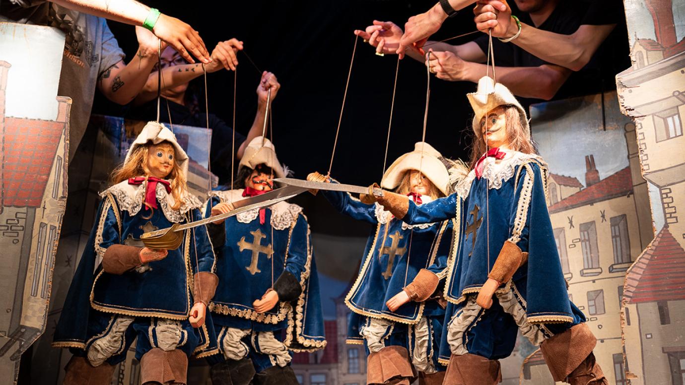 Puppeteers and their knigth puppets at Royal Theatre Toone